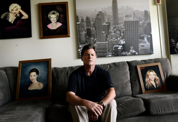 John Mulligan, who served two and a half years in prison with Richard W. Matt, with some of Matt's paintings. Photo by Heather Ainsworth via The New York Times.