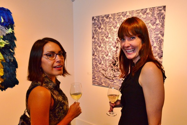Photographer Jenelle Esparza and Ruiz-Healy Art Assistant Director Alana Coates with a work titled “Corinthians – 3/7” 2014.