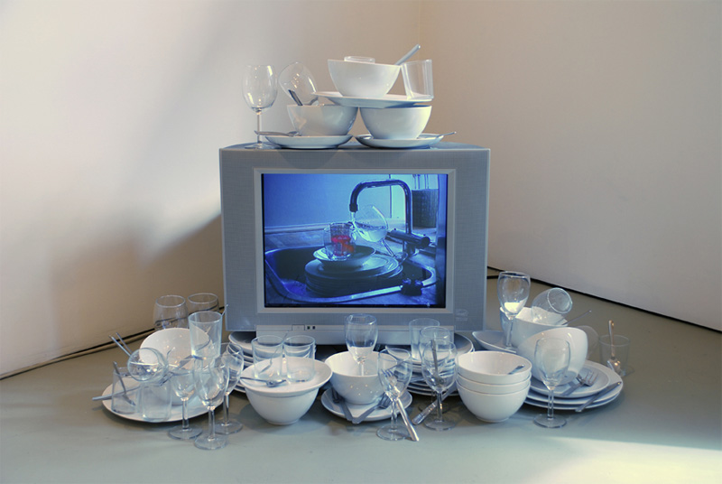 Fountain, 2003, Video, color, sound, 12 plates, 12 bowls, 12 glasses Fountain, 2003, Video, color, sound, 12 plates, 12 bowls, 12 glasses
