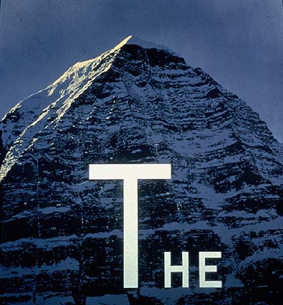 Ed Ruscha's The Mountain, 1998, acrylic on shaped canvas, 76 x 72 inches Ed Ruscha's The Mountain, 1998, acrylic on shaped canvas, 76 x 72 inches