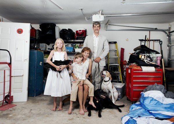 This is a complete traditional family portrait that includes our children, dogs (Onyx and Penny) and chicken (Chocolate) in the not-so-traditional setting of our garage.  The garage was the setting of “Accumulation” and we also use it for developing new projects and of course, storing the lawn mower. 