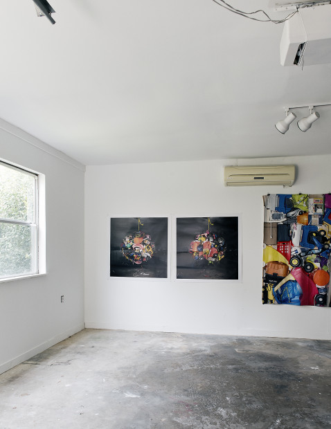 This is a view of the interior of our garage with a photograph of a 6’ in diameter ball of stuff.  These photographs were printed on polar fleece blankets as part of the “Comfort” series. 