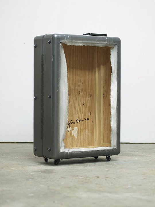 Kaz Oshiro, "Zero Zero Case Spinner (Gun Metal-torn FRAGILE stickers), 2011, acrylic, Bondo on stretched canvas, caster wheels