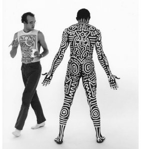 Photo: Tseng Kwong Chi. “Bill T. Jones & Keith Haring,” 1983. Silver gelatin selenium-toned fiber prints, 20 x 16 inches. ©1983 Muna Tseng Dance Projects, Inc. NY. Body drawing on Bill T. Jones by Keith Haring, ©Keith Haring Foundation