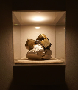 Atramentite #2 (small sculpture on right). Ink, paper, foam core, wax, plaster, wood, plexiglass. Photo courtesy of the artist. 