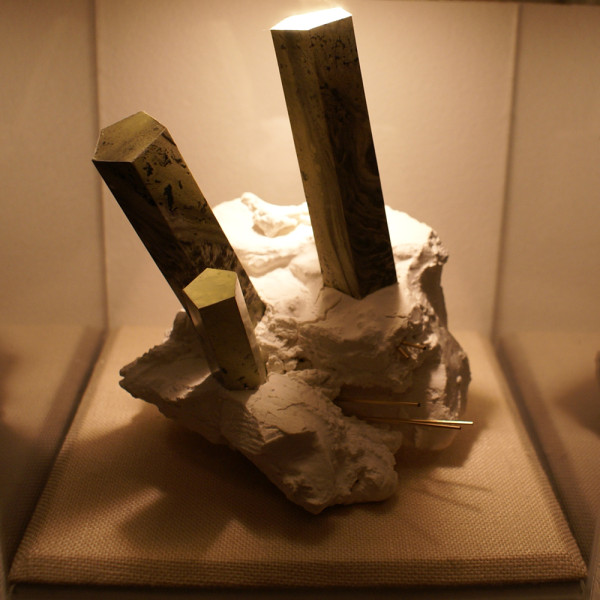 Atramentite # 3 (small sculpture middle). Ink, paper, foam core, wax, plaster, gold rod, wood, plexiglass. Photo courtesy of the artist. 