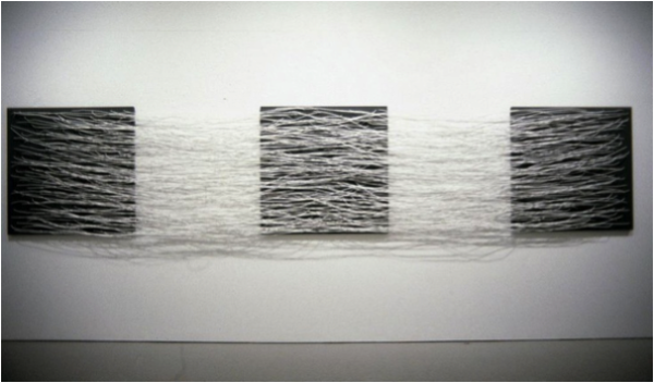 Installation view of Eva Hesse, Metronomic Irregularity II, 1966. Painted wood and cotton-covered wire, 48 x 240 inches. Whereabouts unknown since 1971