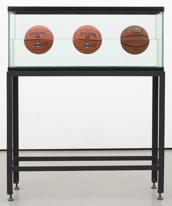 Three Ball 50/50 Tank (Two Dr. J. Silver Series, One Wilson Supershot) Date: 1985 Medium: Glass, painted steel, distilled water, plastic, and three basketballs Dimensions: 60 5/8 x 48 3/4 x 13 1/4" (154 x 123.9 x 33.6 cm) Credit Line: Gift of Werner and Elaine Dannheisser MoMA Number: 226.1991.a-f Copyright: © 2014 Jeff Koons