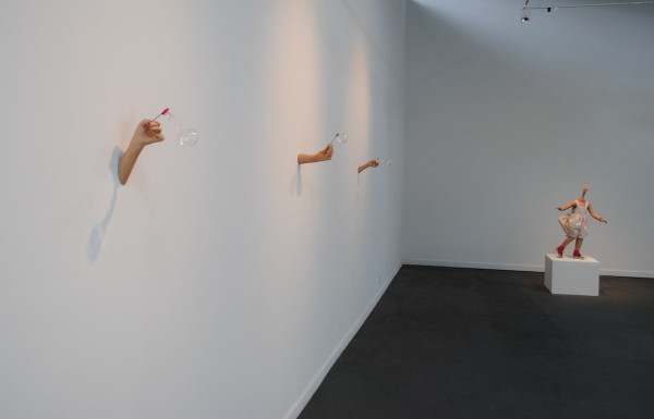 Install shot of <em>If these walls could talk, they'd probably do this instead series and No time to slow down</em>