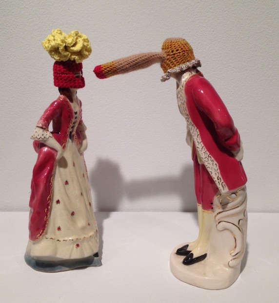 Elaine Bradford, <em>I See You</em>, 2014. Ceramic figurines and crocheted embroidery thread, 10” x 9” x 4”