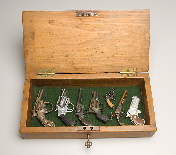 Collection of Guns in a Box