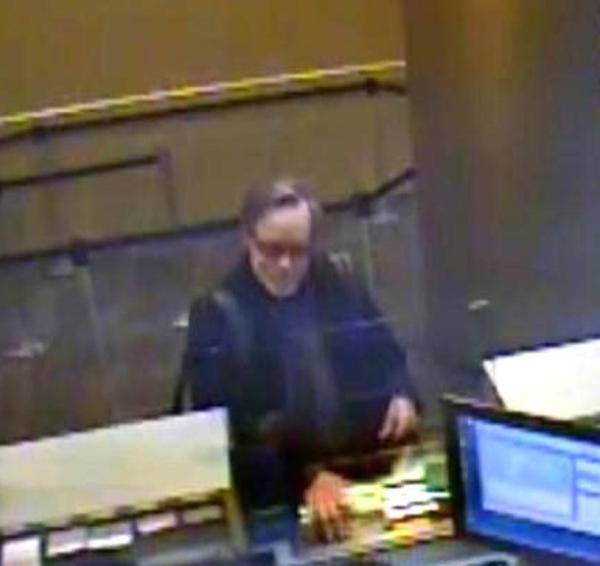 Joseph Gibbons robs a bank as an artwork. Photo NYPD.