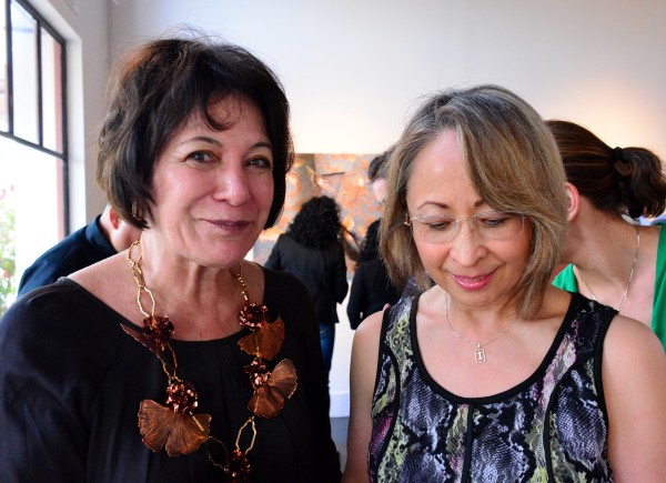 The artist Cecilia Paredes (l) at the opening of her show “The Wandering Flight.”