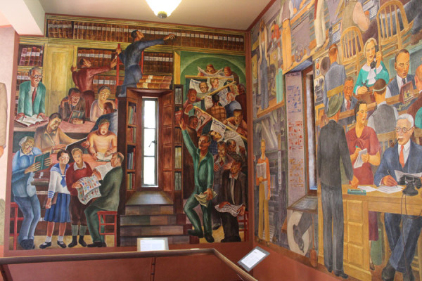 Installation view of the legendary Coit Tower murals in San Francisco, a WPA project