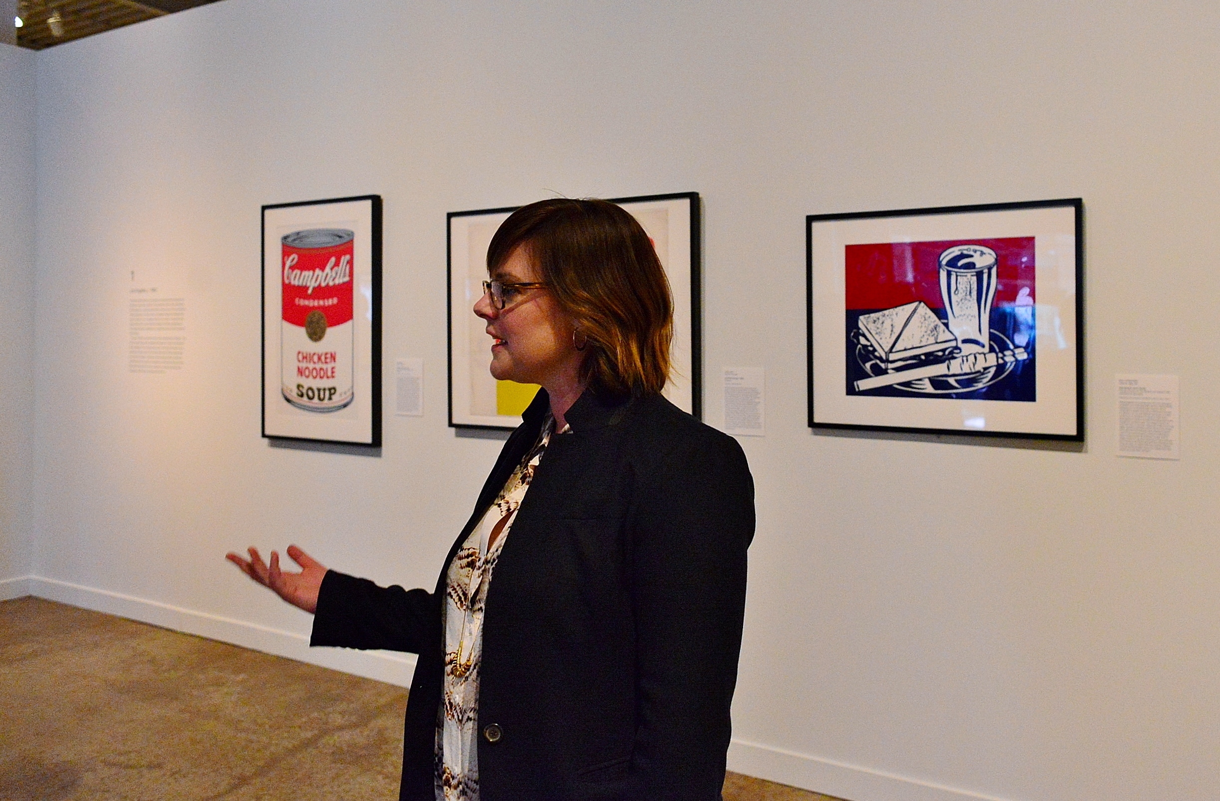 Anna Stothart touring the Cowden Gallery at San Antonio Museum of Art, flanked by Andy Warhol and Roy Lichtenstein