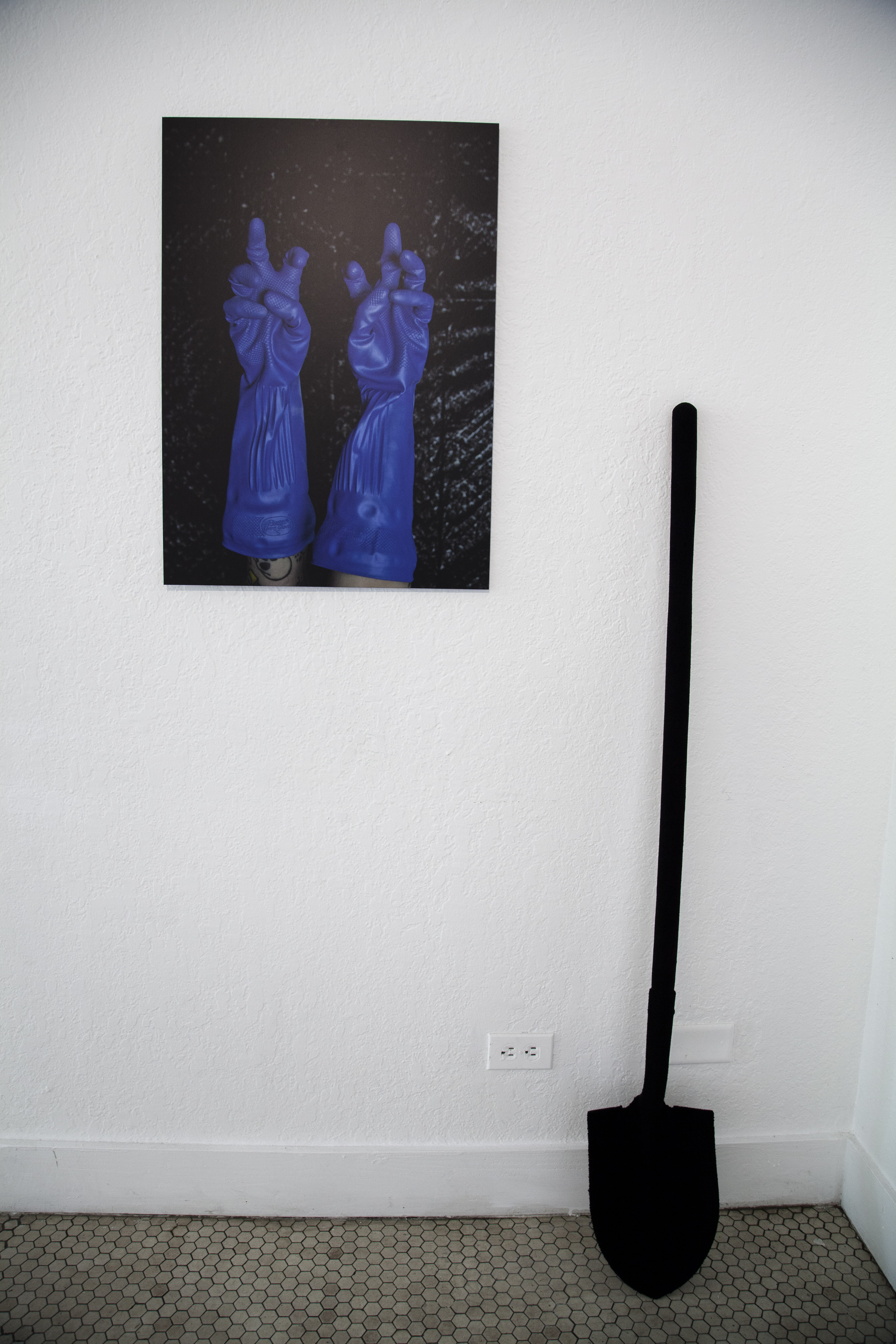 L: Intended to Give Assistance (Gloves), 2016. Archival inkjet print mounted on aluminum. R: For the Groundbreaking Ceremony, 2016. Flocked shovel.