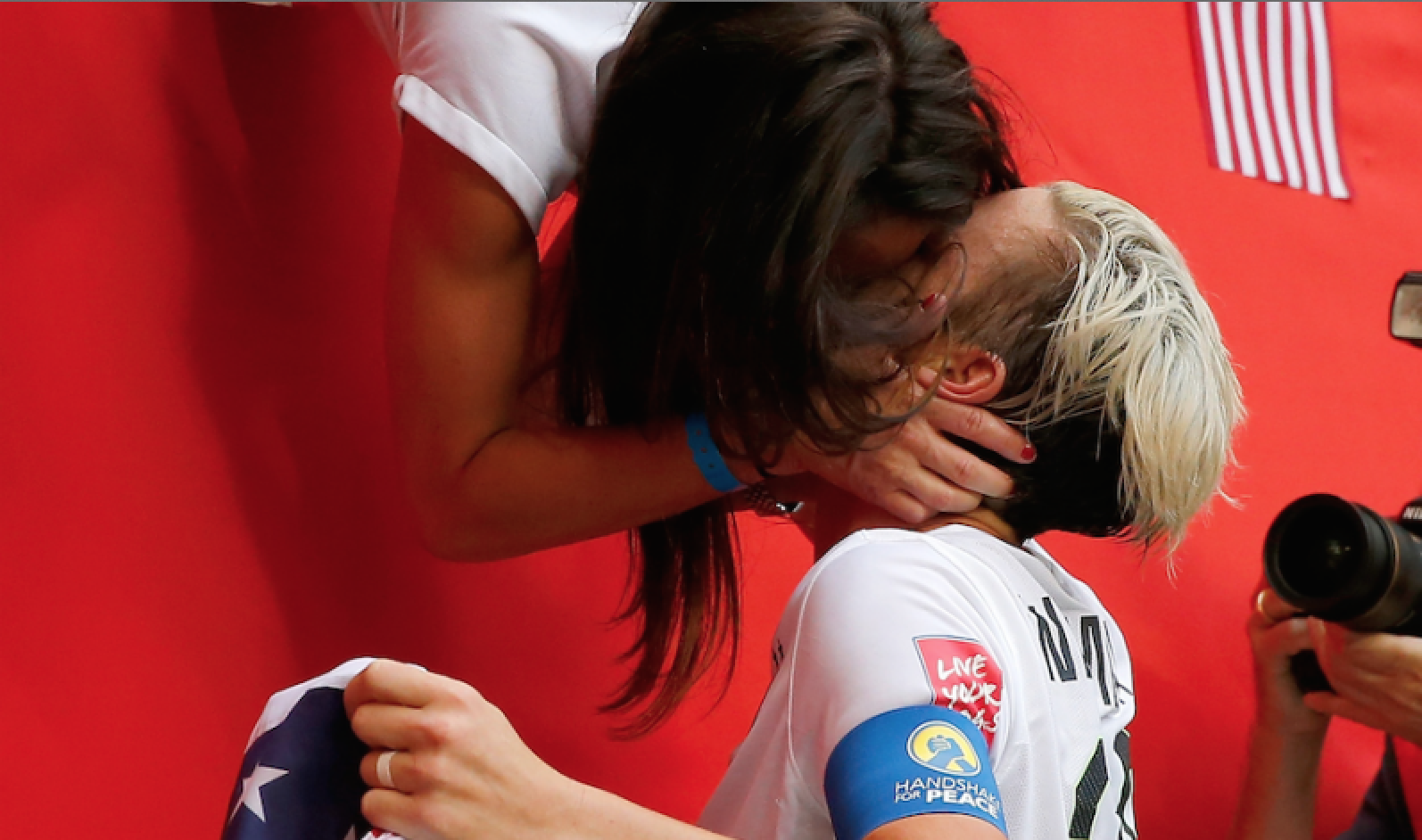 Abby Wambach kissing her wife