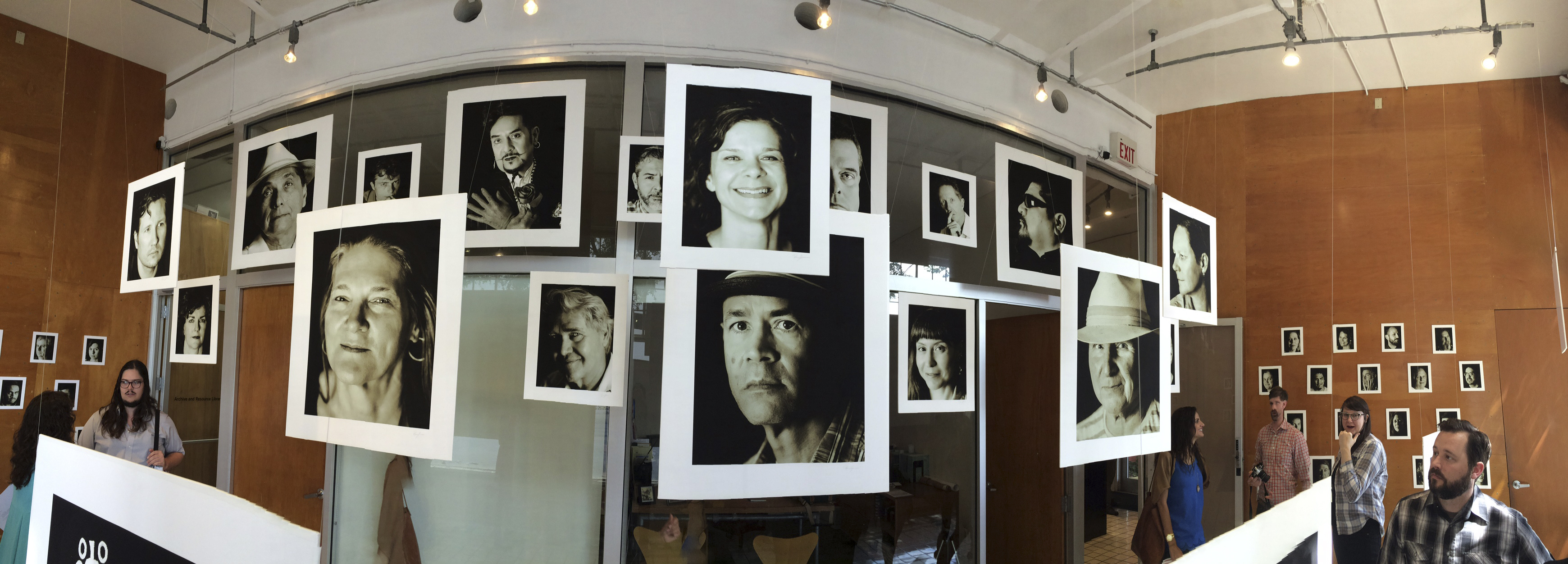 Faces of Artpace, 2016, panoramic view of installation at Artpace Window Works
