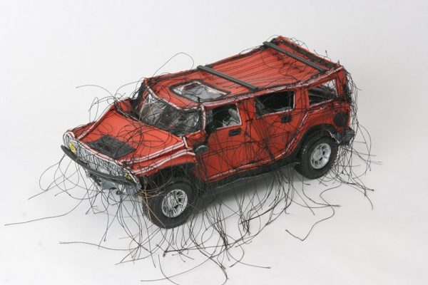 Mini-Hummer (Red MC-104), 2005, vinyl, thread, model parts, 4 1/2 x 10 x 5 in., Courtesy of Ruiz-Healy Art