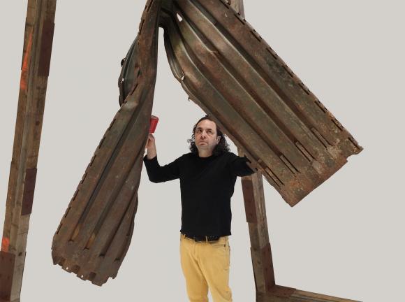 Guillermo Galindo Playing The Angel Exterminador (Exterminating Angel) Section of border wall, Border Patrol drag chain, wood blocking used in construction of border wall
