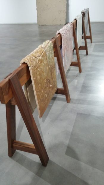 Draped Marble (Fior di Pesco Carnico, Fior di Pesco Apuano, Crema Dorlion, Onyx), marble mounted on steel on wooden sawhorse, 2015