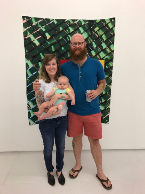 The Renner-Peacock family at Art Palace pictured in front of work by Jim Nolan. Image courtesy of Emily Peacock.