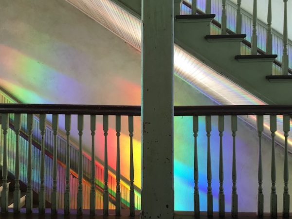 Window Rainbow: Much of the building has been restored to its original state, with gentle additions like this rainbow installation on the stairwell by ­­­­Randell Morgan. Photo credit: Kyle Hobratschk.