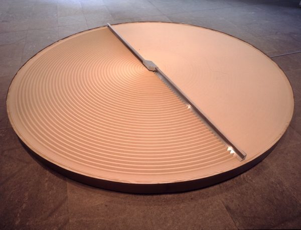 + and -, 1994-2004. Steel, aluminum, sand, and electric motor. 10 3/4 x 165 1/4 x 165 1/4 inches.