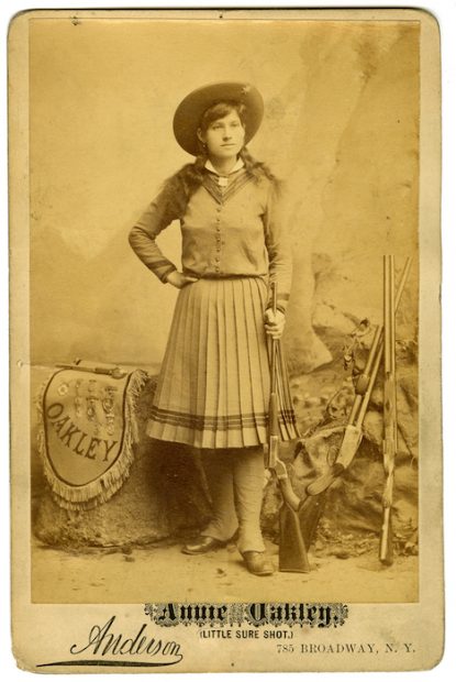 David H. Anderson (American, 1855-1905), Annie Oakley, Little Sure Shot, 1886. Albumen silver print, 16.4 x 10.7 cm. Albert Davis / Circus Collection, Harry Ransom Center.