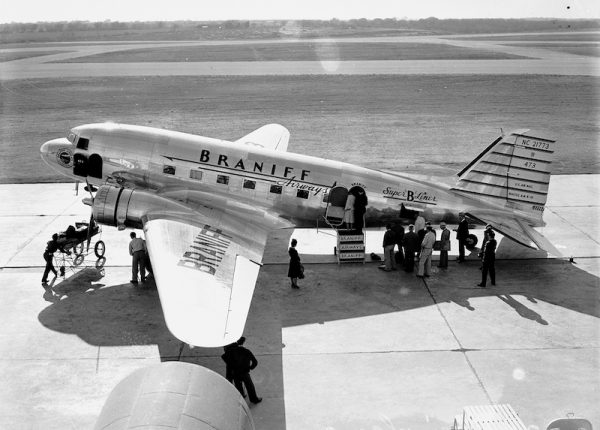 Passengers board airliner at Stinson Municipal Airport, 1939. San Antonio Light Photograph Collection