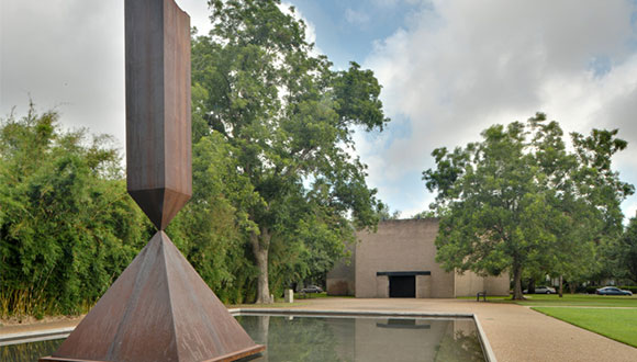 Photo of the Rothko Chapel building and reflecting Pool in Houston, Texas.