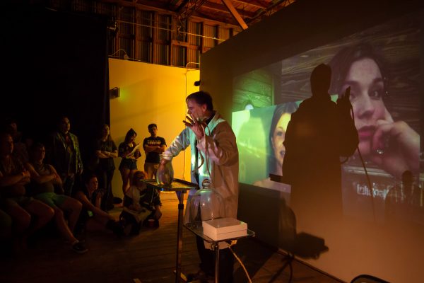 Jim Pirtle performing at the 2019 Satellite Art Show in Austin, Texas