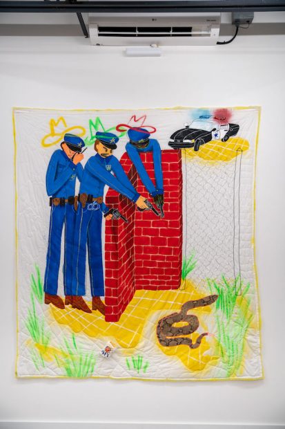 Alexis Mabry, The Cops, found fabric, acrylic, spray paint, oil pastel, thread, chicken wire, quilt batting, 86 x 78”