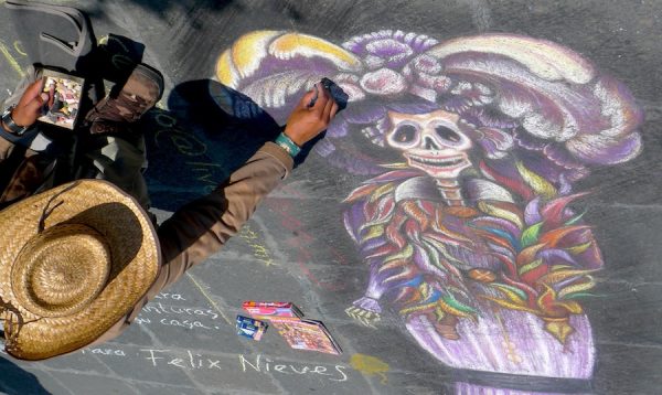 Felix Nieves, Catrina figure being rendered in chalk, 2009, Zocalo, Mexico City, 