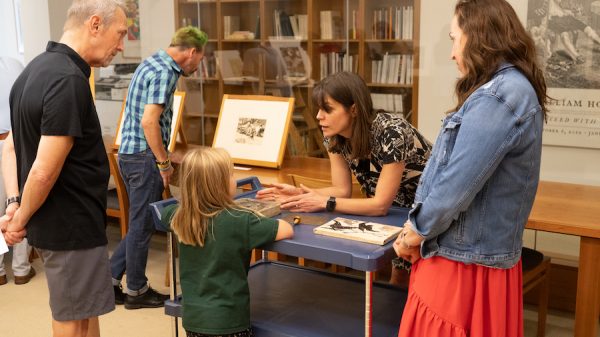 Curator of Prints and Drawings Holly Borham explains printmaking techniques to visitors 