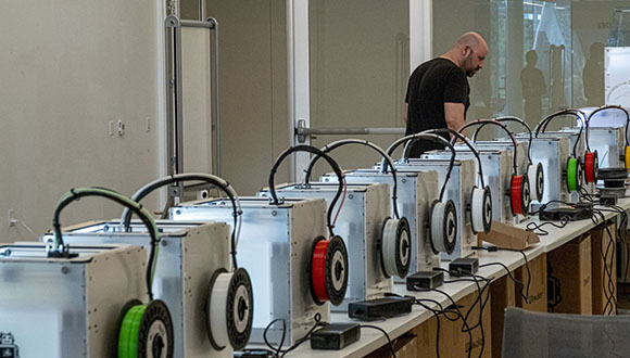 The Moody Center for the Arts has 15 additional 3D printers now running in its studio space, creating face shields under the supervision of Rob Purvis-(Photos by Jeff Fitlow)