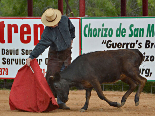 Cesar Martínez, training with a young heifer at the Santa Maria Bullring, near Santa Elena, Texas, 2013