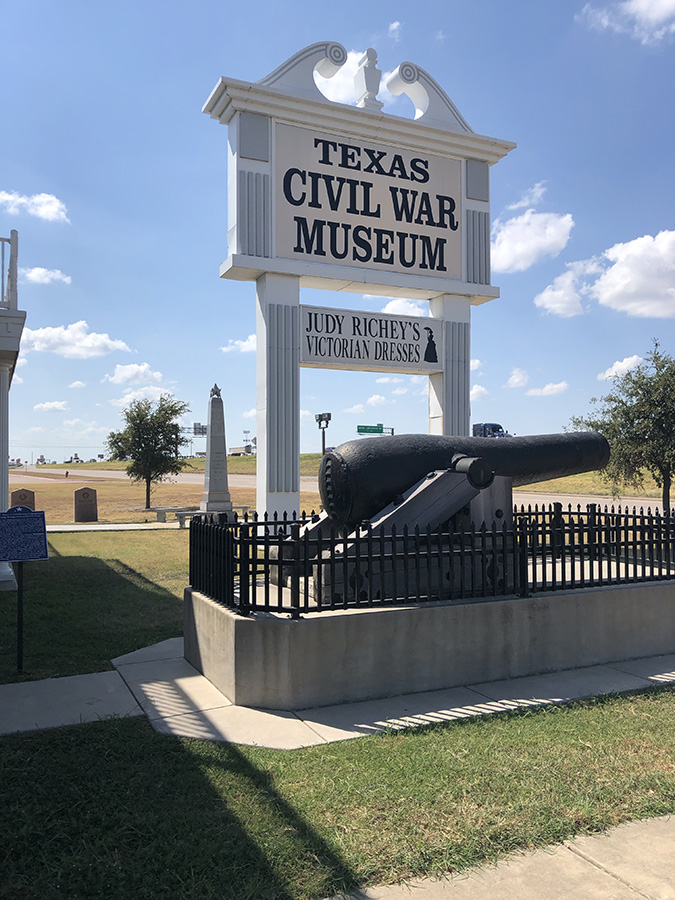 Entrance to Texas Civil War Museum with a 10-inch bore Confederate Columbaid Long Range Smoothbore Gun, which points toward the highway