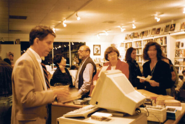 Karl_Kilian_working_the_register_after_an_event-courtesy of Brazos Book Store, via Houstonia magazine.