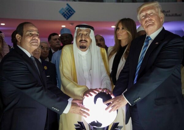 Donald Trump touching a glowing orb