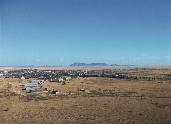 View of Marfa with the Puertacita Mountains in the background, the Chinati Foundation in the foreground. Photo by Florian Holzherr