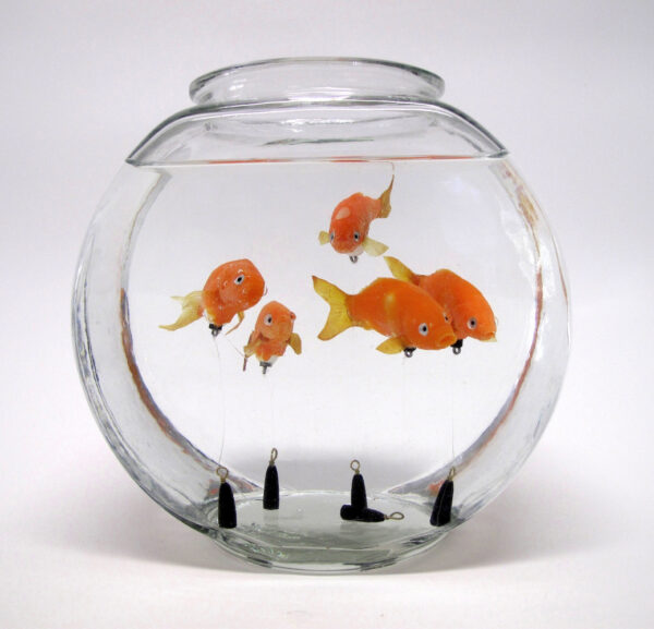 Sculpture of a round fish bowl, featuring hyper realistic sculptures of orange goldfish
