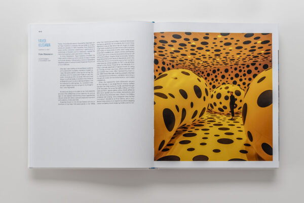 Two-page spread from the book One Thing Well: 22 Years of Installation Art. The left page features text, and the right page features a yellow installation of abstract forms, all featuring black polkadots 