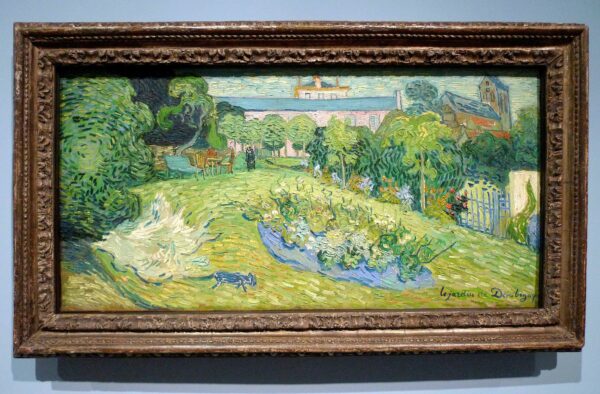 A landscape painting of trees by Van Gogh.