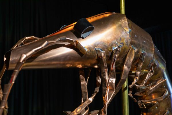 Detail image of a large aluminum sculpture of a shrimp