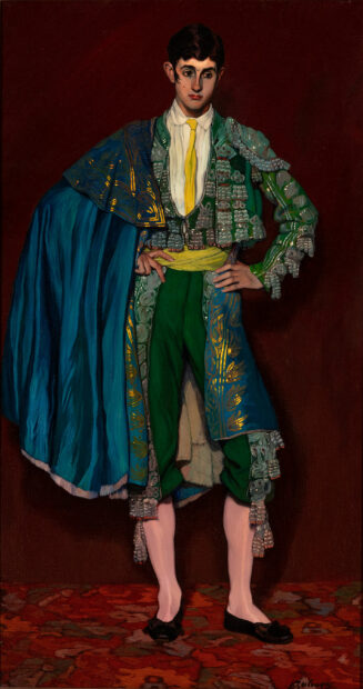 Painting of a bullfighter. The figure is wearing a green colored suit and a blue cape.