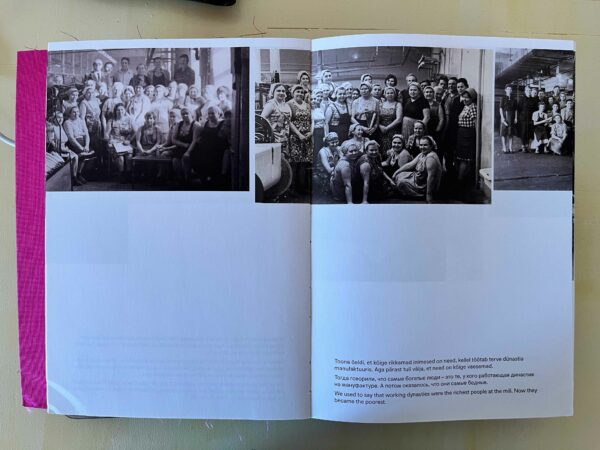 A spread of a catalog featuring black and white photographs of factory workers. 