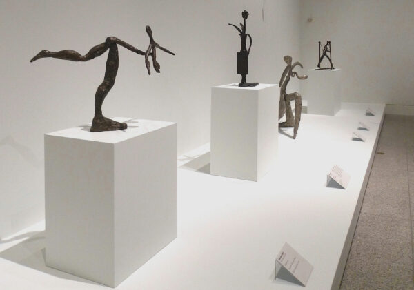 Bronze sculptures of figures in motion