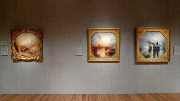 Installation view of three paintings by JMW Turner
