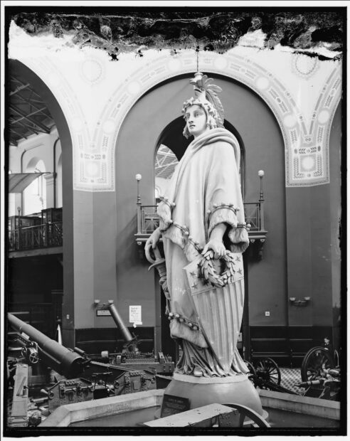 A black and white photo of a plaster cast of a monumental sculpture of lady Freedom